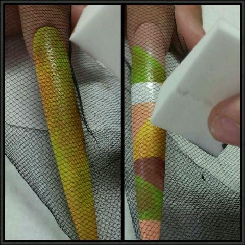 step 3 snake \nuse netting and with a makeup sponge lightly pat on nail (this will give you a reptile look\n\nstep 3 safari\nrepeat step 2 on the green and yellow (let dry)