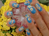 dotts flower on blue nails