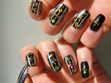 black and gold geometric nail art