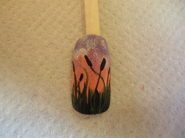 Mix your green acrylic paint with some black to create a very dark almost black green colour and paint with it the heads of the plants and some shadows on the tip of the nail.