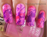Pink and purple splatter nail art