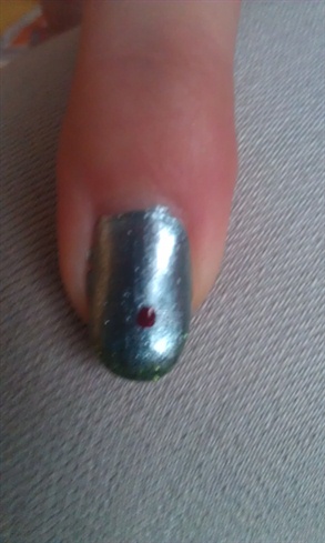 With dooting tool I made red dot  (maybe) in the middle of the nail.