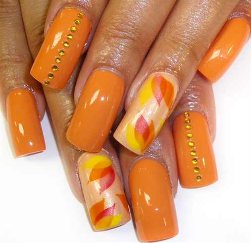 orange polish with petal accents