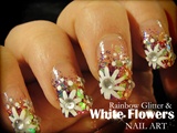 Rainbow glitter &amp; White flowers nail art