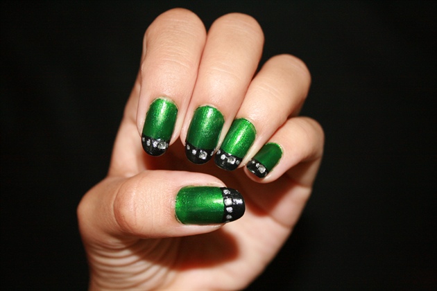 7. "Edgy Studded Nail Art Designs for a Rocker Vibe" - wide 4