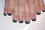 black manicure with flowers