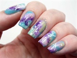 Pastel galaxy nails