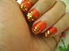 red and gold glitter nails