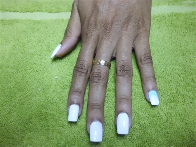 Base nails with white polish and start with the lightest blue, sponge cuticle area,then use the