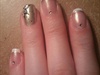 French manicure with gold accents