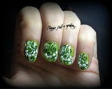 Pearl embellished floral green nails