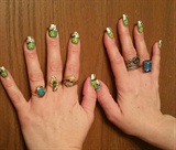 Green and gold polish with yellow flowers/clear rhinestones