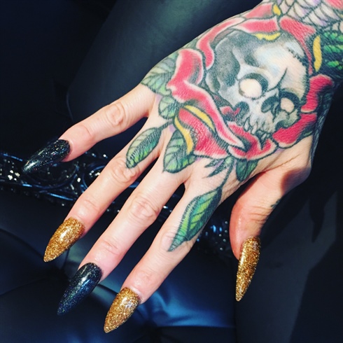 Black And Gold Glitter Stiletto Nails