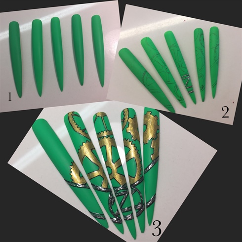 I started by painting 5 extra long nail tips with a bright emerald green gel polish and finished it with a matte top coat.\nI drew on cog/gear details and a representation of the bars above the gates to the emerald city underneath the gears.\nUsing leaf gels for the gates and acrylic paint for the gears, i painted and cured them.\nThese were finished in a gloss top coat to give some dimension.
