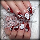 classy red nails with 3d roses