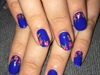 Blue Manicure With Flowers