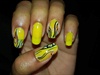 yellow nails with black lines