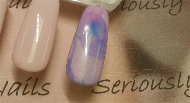 From at least 5 inches away, spray alcohol on the nail with the Sharpie on it. Allow to dry.
