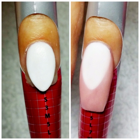 On the ring fingers of each hand, apply nail form. Using acrylic, sculpt the nail bed in an almond shape using CNDs retention plus white powder acrylic. Then apply INMs cover pink to create the nail tip. This will give you my reverse French design.