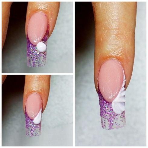 To create the 3D sculpted wings, use CNDs retention plus white powder acrylic. Take a small pearl on your brush and remove moisture by dotting the back of your brush on a paper towel. This ensures that your pearl is not too wet and a little stiff, which is ideal for sculpting. Place the pearl at the tip of the sculpted nail bed. Drag the pearl gently down the side of the sculpted nail bed towards the cuticle. Pat the acrylic flat. Wet your brush and smooth it out on a paper towel. Roll and push the acrylic up using the sharp side of the brush to create the texture of each wing. Repeat this on the reverse side of the nail. Continue this process for each nail. Once wings are sculpted and cured, use a diluted pastel purple acrylic paint to couture the depth in the wings. This allows you to see the dimension of the wings after you apply the gel top coat in step 6.
