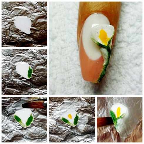 Use INMs 3D sculpture acrylic in glitter white to begin your calla lily. Lay the pearl on a piece of foil and pat the pearl flat into a fan shape. Apply green sculpture acrylic to the outer edges of the fan shape. Next apply a small yellow acrylic pearl to the center and drag down. Before the acrylic is completely hardened, wet your brush and begin to pull the outer edges over the center to create the calla lily shape. Take a crystal clear acrylic and apply to the ring finger nail. Before your calla lily is completely cured, pick up with a damp brush and attach to nail. You will be able to mold, form and position your flower shape before it is cured. Be careful not to cover the center of your perfect pink and white smile line.