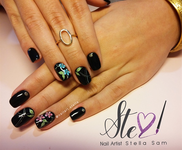 6. Black and Floral Nail Art - wide 1