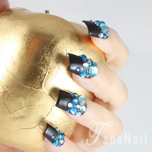 Black color nails with blue rhinestones