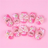 Pink 3D ribbon nails