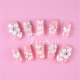 Lovely pink nails with white flower