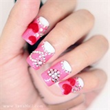 Pink nails with fuzzy heart