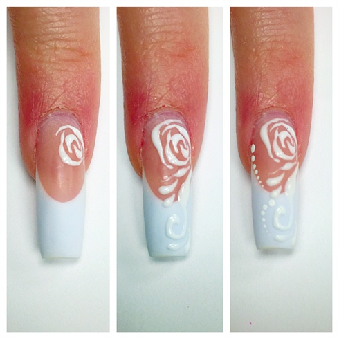 with nails buffed and prep paint embroidered flowers with white builder gel to create a 3D raised embossed look on pinky