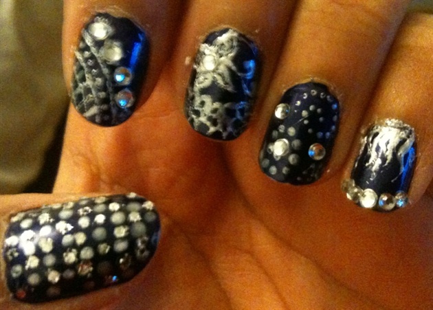 Navy and silver nail art with rhinestone