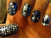 Navy and silver nail art with rhinestone