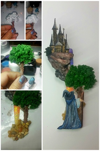 THE JOURNEY: 1- cover tin foil with white acrylic, create texture and colour using 2 shades of coloured acrylic 2-sculpt out branches and attach to the tree 3- adhere coloured sponges to create tree 4- adhere stones to create the 