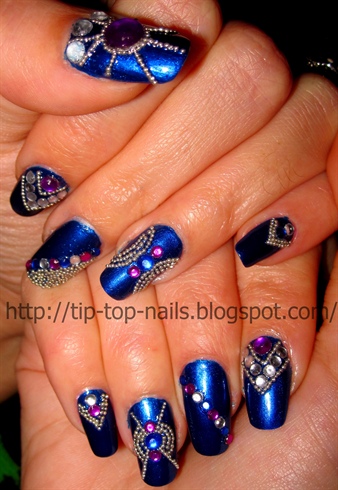 Blue metallic nail with beads