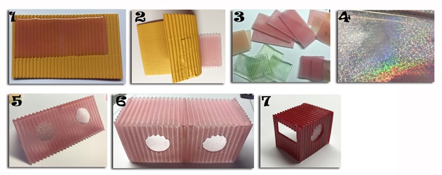 1. Create the structure of the containers using ribbed carton. Apply a generous layer of LED builder gel onto the paper and cure. 2. Gently remove the cured gel from the carton. 3. My work in progress. 4. Cut strips of holographic wrapping paper. 5. Using an electric drill, drill windows into the sides of the container and apply the holographic wrapping paper to the windows. 6. Attach the various parts of the container together with LED builder gel. 7. Decorate each container with is very own bold gel polish.