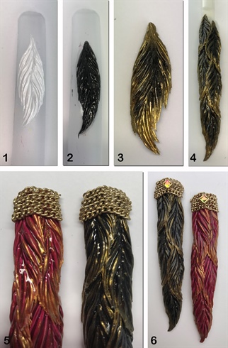 1. Using White Gel Paste create a feather on an Arabella Form for easy removal. Use a second layer to create deeper relief. 2. Apply a thin layer of Black LED Gel which will also create a tacky base for the Gold Pigment to adhere to. 3. Dust on the Gold Pigment along the edges of the feather to further enhance the relief. 4. Layer the feathers along the base tip, securing them into place with Clear LED Gel. 5/6. Finish the design by adding some layered chain detail at the cuticle area.