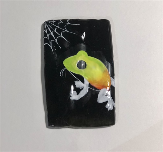 To create the multicolored frog fill in each section you outlined separately. To make your colors really pop on dark backgrounds lay down a layer of white first.  This is a great tip if you use regular gel polish for your nail art.
