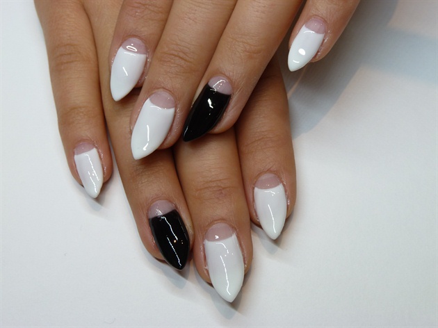 Clean and prepare nails for application. Begin by applying your half moon french using gel polish and cure. I have chosen white for all of the nails except for the ring fingers, where I have used black to create a feature.
