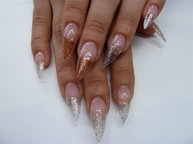 Apply a clear base using gel or gel polish and apply a little glitter to the free edge.