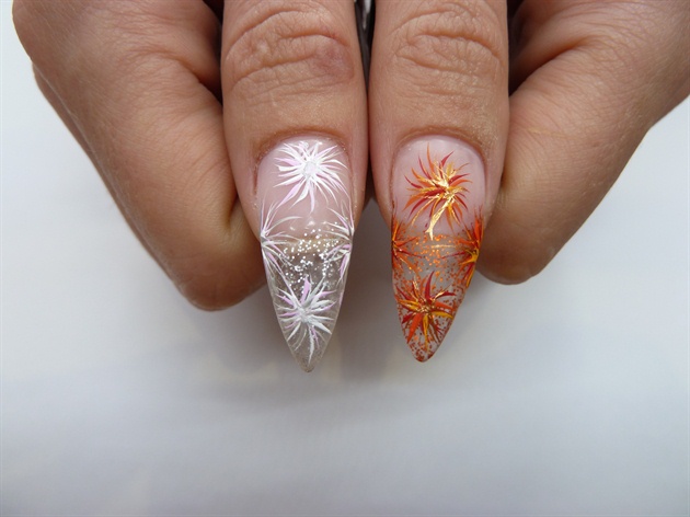 Add your firework detailing with some acrylic paints. \n(I chose to add fireworks to commemorate Entity Beauty's 10 year Anniversary, however you may choose to omit this step and continue with your own motto or add some more wings to the thumbs to complete your own unique look.)