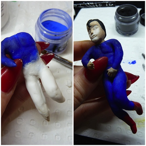 Superman's suit was applied using blue acrylic and the logo and detailing were painted with acrylic paint.