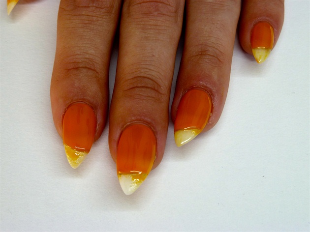 I began with a light orange gel polish and applied it to create my sunset sky then cured. (I used a few layers to deepen the color)