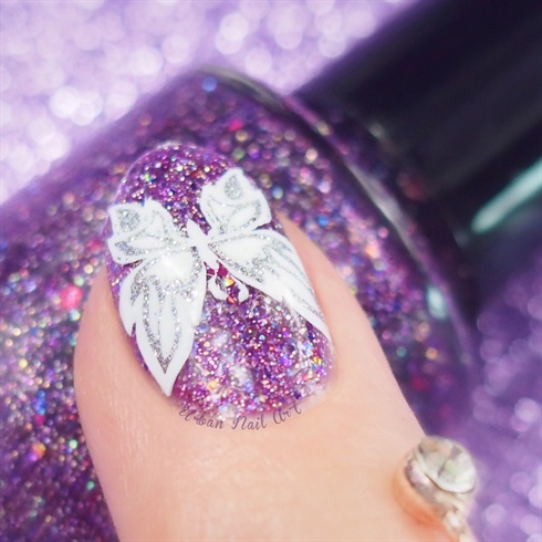 A close-up shot of Butterfly manicure