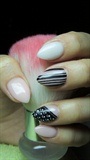 Gently pink nails with black lines