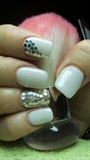 Silver nails, rhinestones and glitter