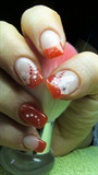 Red french manicure with white flower