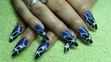 Black and blue nails with white lines