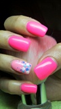 Pink nails with blue and white dots