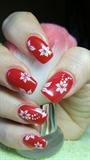Red nails with white flowers